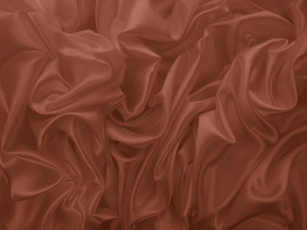 istock Beautiful elegant wavy brown satin silk luxury cloth fabric texture. 1257221896