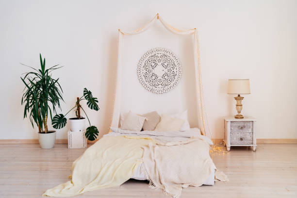 istock four-poster bed and bright interior. Scandinavian style. 1257223239