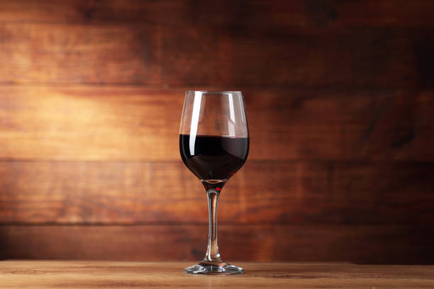 goblet with wine on the counter