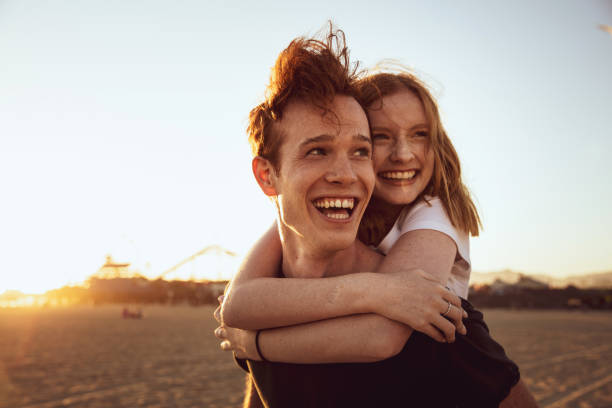 istock Lovely couple flirting at sunset 1257225091