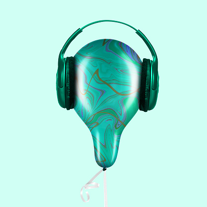 Music for weightless. Green lightbulb with headphones on green background. Copyspace to insert your text. Modern design. Contemporary artwork, collage. Concept of inspiration, creativity, artwork.