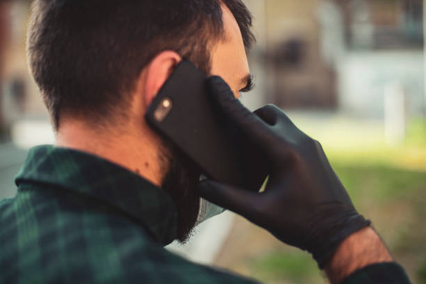 Phone conversations in the age of the virus stock photo