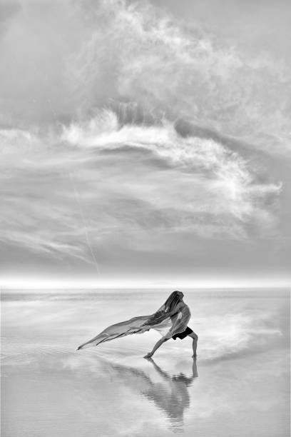 Ballerinas dancing at sunset on the lake - Salt lake in Turkey