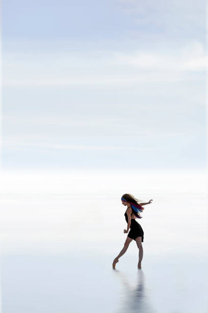 Ballerinas dancing at sunset on the lake - Salt lake in Turkey