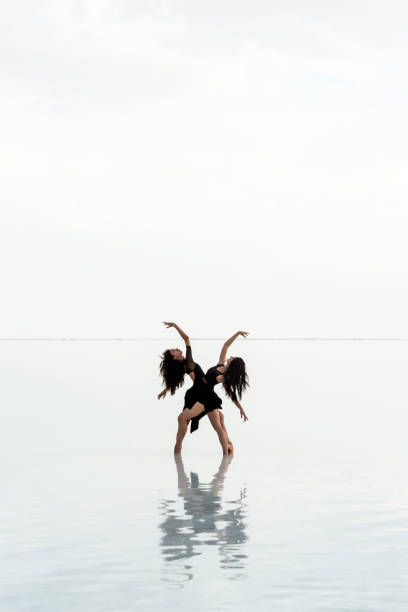 istock Ballerina dancing on the lake 1257226773