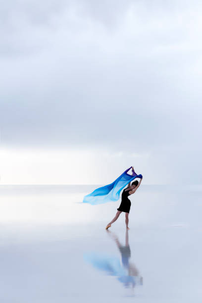istock Ballerina dancing on the lake 1257226859