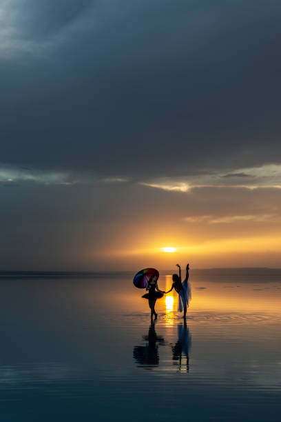 istock Ballerina dancing on the lake 1257226986