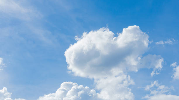 istock The sky with white clouds in a beautiful heart shape 1257227000