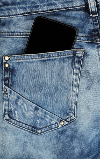 istock Black smartphone in jeans back pocket 1257228168