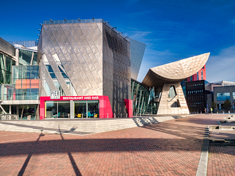 2 November 2018: Salford Quays, Manchester, UK -  The Lowry, and Pier 8 Restaurant and Bar, on a beautiful sunny autumn day.