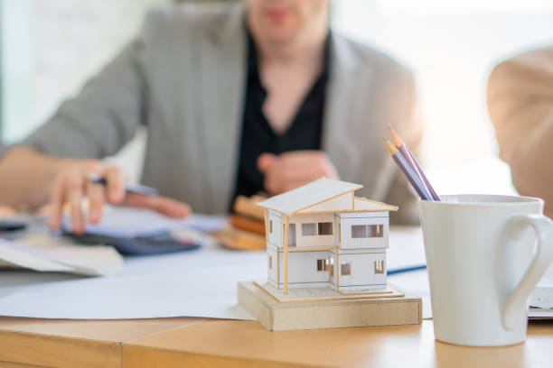 istock Real Estate business interior architect professional teamwork design video conference online meeting new normal yellow safety helmet with Europe Manage and Asian Team with happy smile success contract 1257231997
