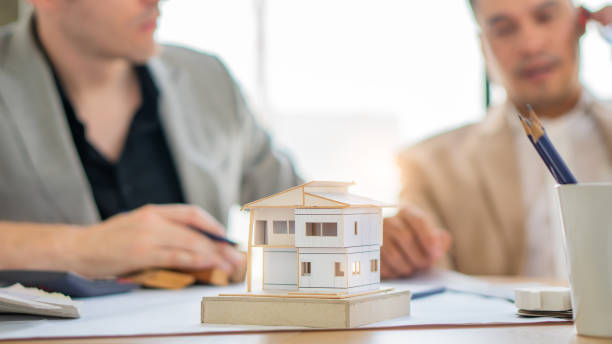 istock Real Estate business interior architect professional teamwork design video conference online meeting new normal yellow safety helmet with Europe Manage and Asian Team with happy smile success contract 1257232537