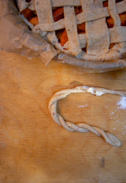 istock homemade pie with apricots. cooking process. Summer baking 1257240177