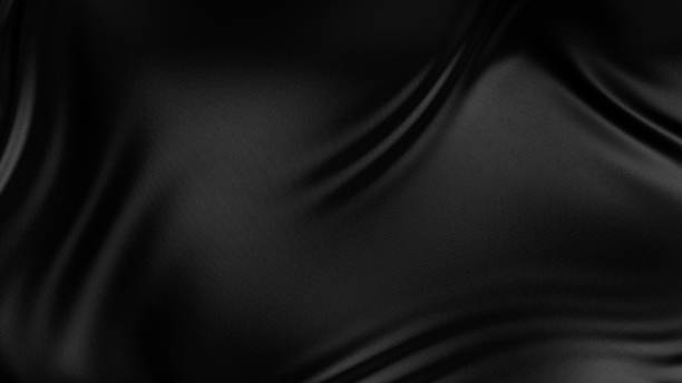 istock Luxury black cloth satin abstract background 1257241335