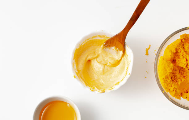 istock Mixed turmeric, honey and yogurt for a home Spa treatment 1257248285