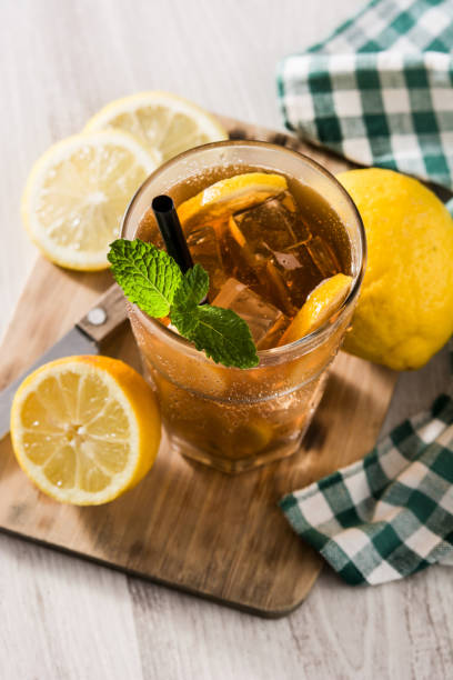 istock Iced tea drink with lemon in glass and ice 1257250583