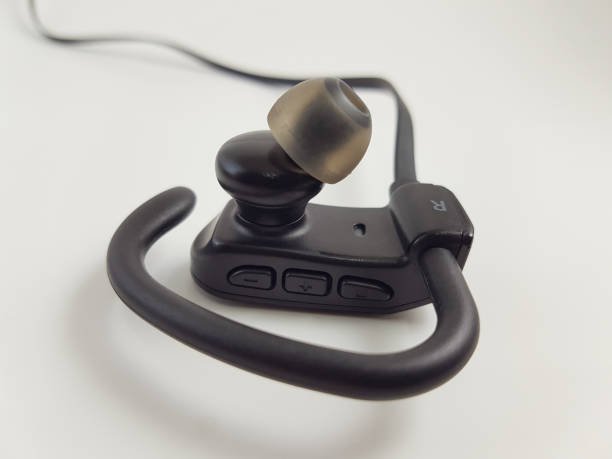 istock Black Bluetooth Headset, Bluetooth Sport Earphones With Earhook, Isolated on White Background 1257251334