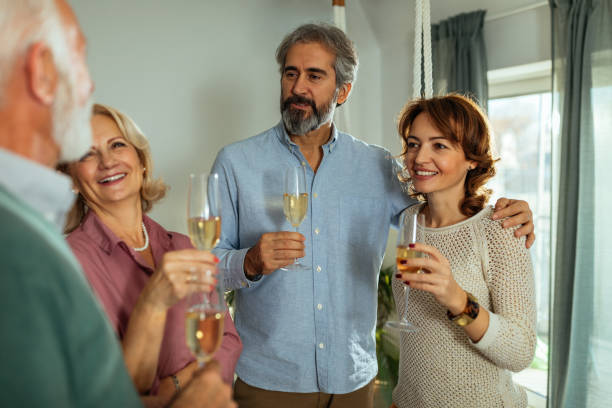 istock Good old friends getting together for drinks 1257266615