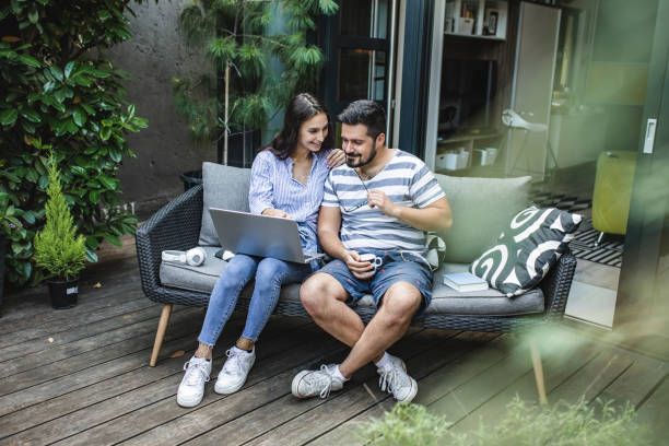 istock Young couple relaxing couple at home 1257266684