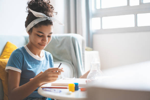 istock Teenager studying art 1257268562