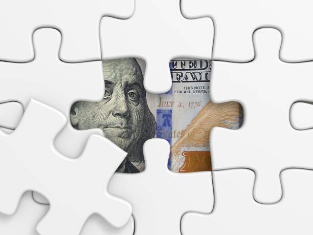 istock Money finance building solution puzzle 1257269264