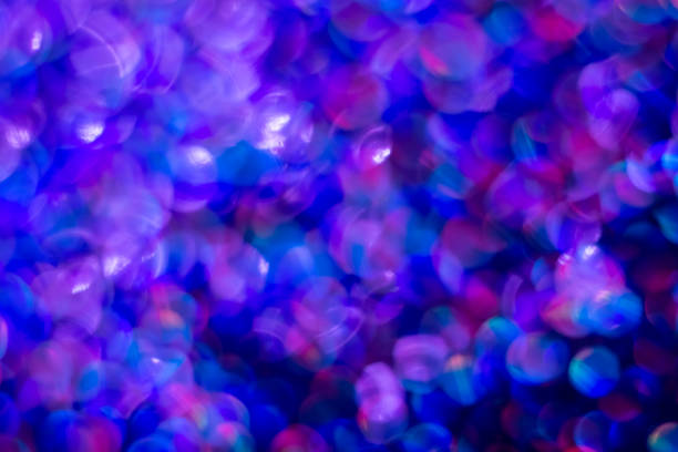 istock Rainbow blue glitter festive background with bokeh lights. Celebration concept for Holidays and anniversary 1257269356
