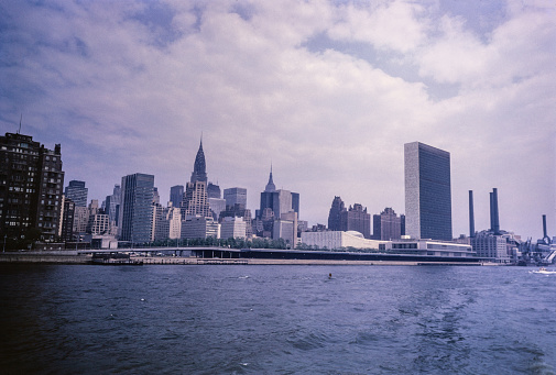 New York City in the 1950's. New York City comprises 5 boroughs sitting where the Hudson River meets the Atlantic Ocean. At its core is Manhattan, a densely populated borough that’s among the world’s major commercial, financial and cultural centers. Its iconic sites include skyscrapers such as the Empire State Building and sprawling Central Park. Broadway theater is staged in neon-lit Times Square.