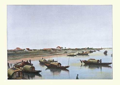 Antique colourised photograph of Ben Thuy a trading port on the mouth of the Ca River in Vietnam. 19th Century