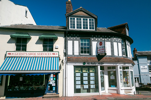 McAuley Miller Real Estate Agents in Royal Tunbridge Wells, England, next door to Guest's Shoe Services on Mount Ephraim