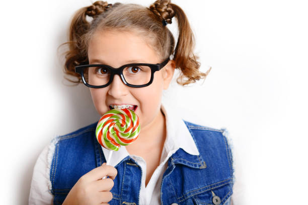 istock schoolgirl on white background 1257273369