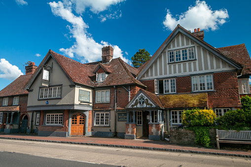 The White Hart in Brasted near Westerham in England. A coat of arms for the pub is in the foreground.