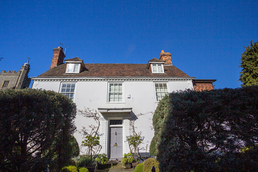 Facade and front view of two-story house, probably privately owned, in Sevenoaks in Kent, England