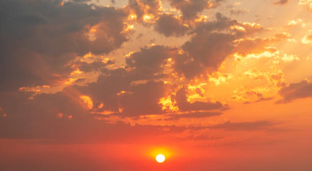 istock Beautiful colorful sunset sky with orange clouds. Nature sky background. 1257276207