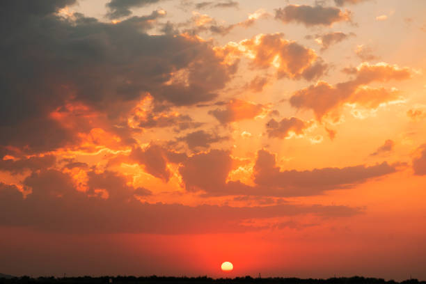istock Beautiful colorful sunset sky with orange clouds. Nature sky background. 1257276243