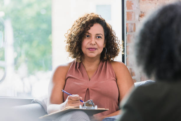 istock Compassionate therapist listens to patient 1257279632