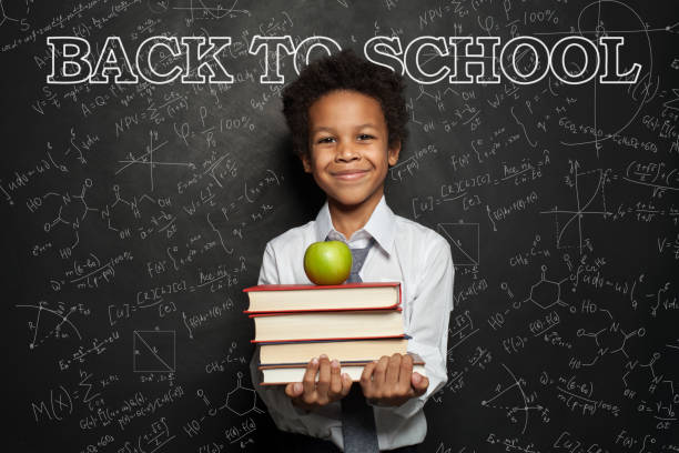 istock African American child student with science formulas background, back to school concept 1257280875