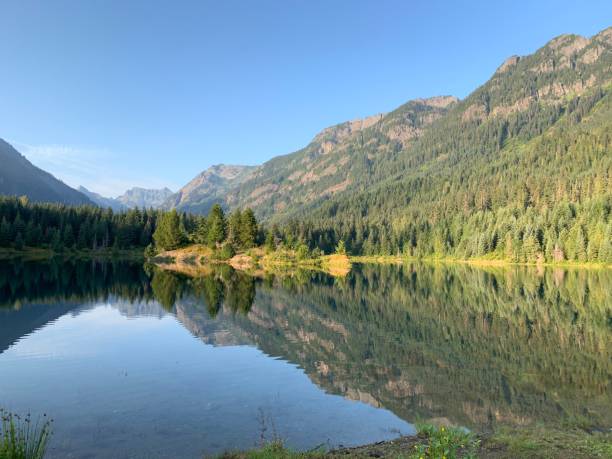 istock Beautiful lake with mountains 1257282174