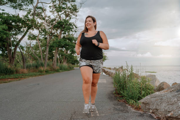istock Woman exercising outdoors 1257285609