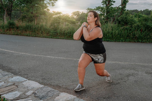 istock Woman exercising outdoors 1257285816