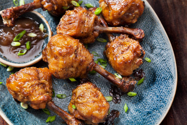 istock Honey Garlic Lollipop Chicken Wings with Carrots and Celery 1257287681