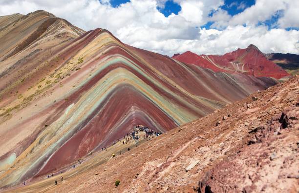 istock Rainbow mountains Andes near Cusco in Peru 1257293177