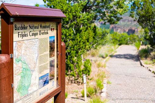 Santa Fe, USA - June 17, 2019: Information map trail sign at Main Loop path in Bandelier National Monument in New Mexico in Los Alamos and footpath