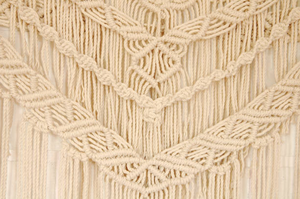 istock Macrame pattern. A minimal, stylish, trendy concept with a beautiful background with light neutral colors. 1257295897