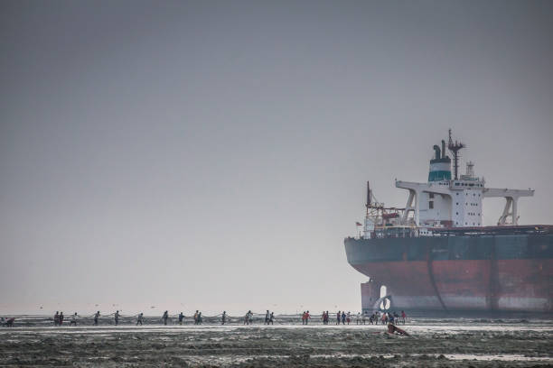 Chittagong, Bangladesh, 24th February 2016: workers at the Chittagong ship breaking yard
