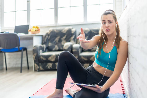 istock Woman working out at home 1257300553