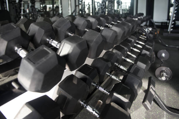 istock Rows Of Dumbbells In The Gym 1257301204