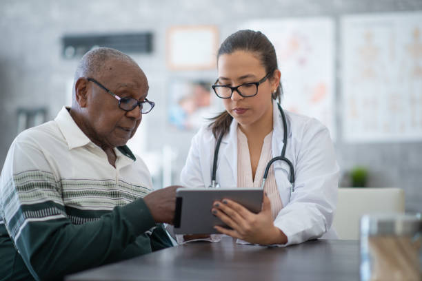 Man seeing his medical test results on tablet