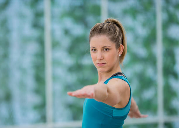 istock One woman yoga 1257305611