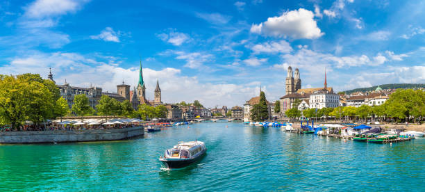 Historical part of Zurich, Switzerland Historical part of Zurich with famous Fraumunster and Grossmunster churches in a beautiful summer day, Switzerland switzerland zurich architecture church stock pictures, royalty-free photos & images