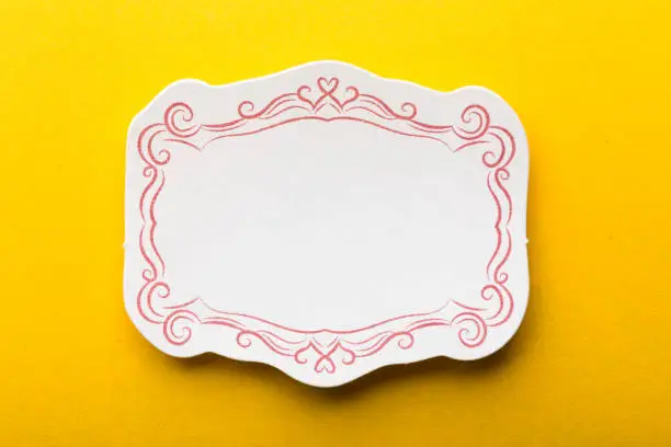 Photo of Blank Frame Label On Yellow Background